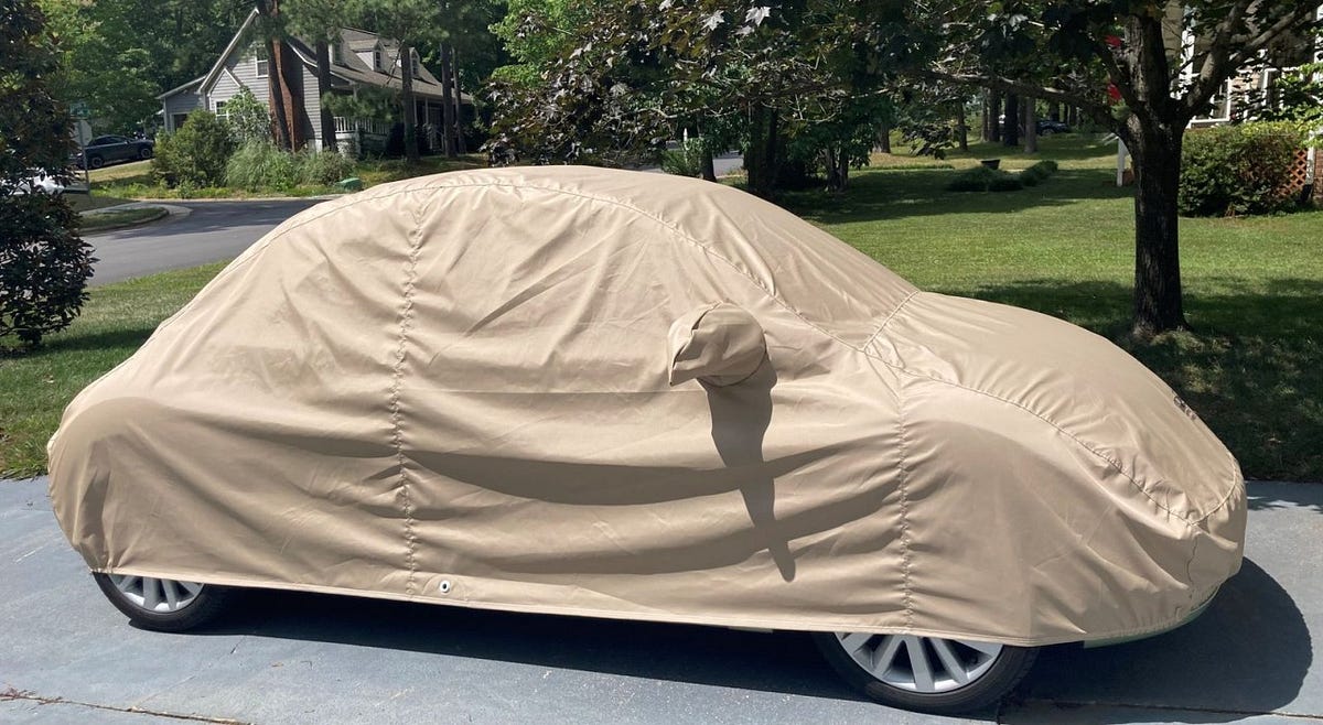 How to Use a Tarpaulin to Protect Your Car | by Tarpaulin From UK | Aug, 2024 | Medium